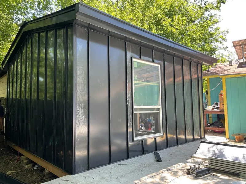 Black standing seam metal wall panels for Roof Inspection in Vista