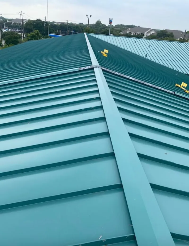 Green commercial metal roof ridge and valley for Metal Roof Repair in Vista